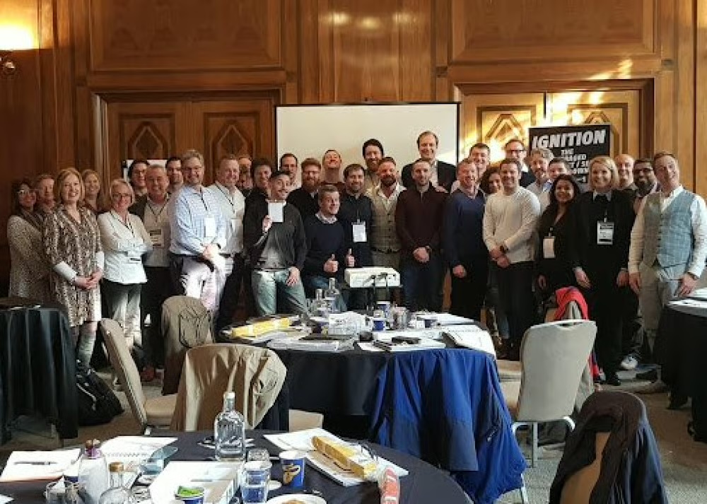 Apex mastermind group photo at a London venue